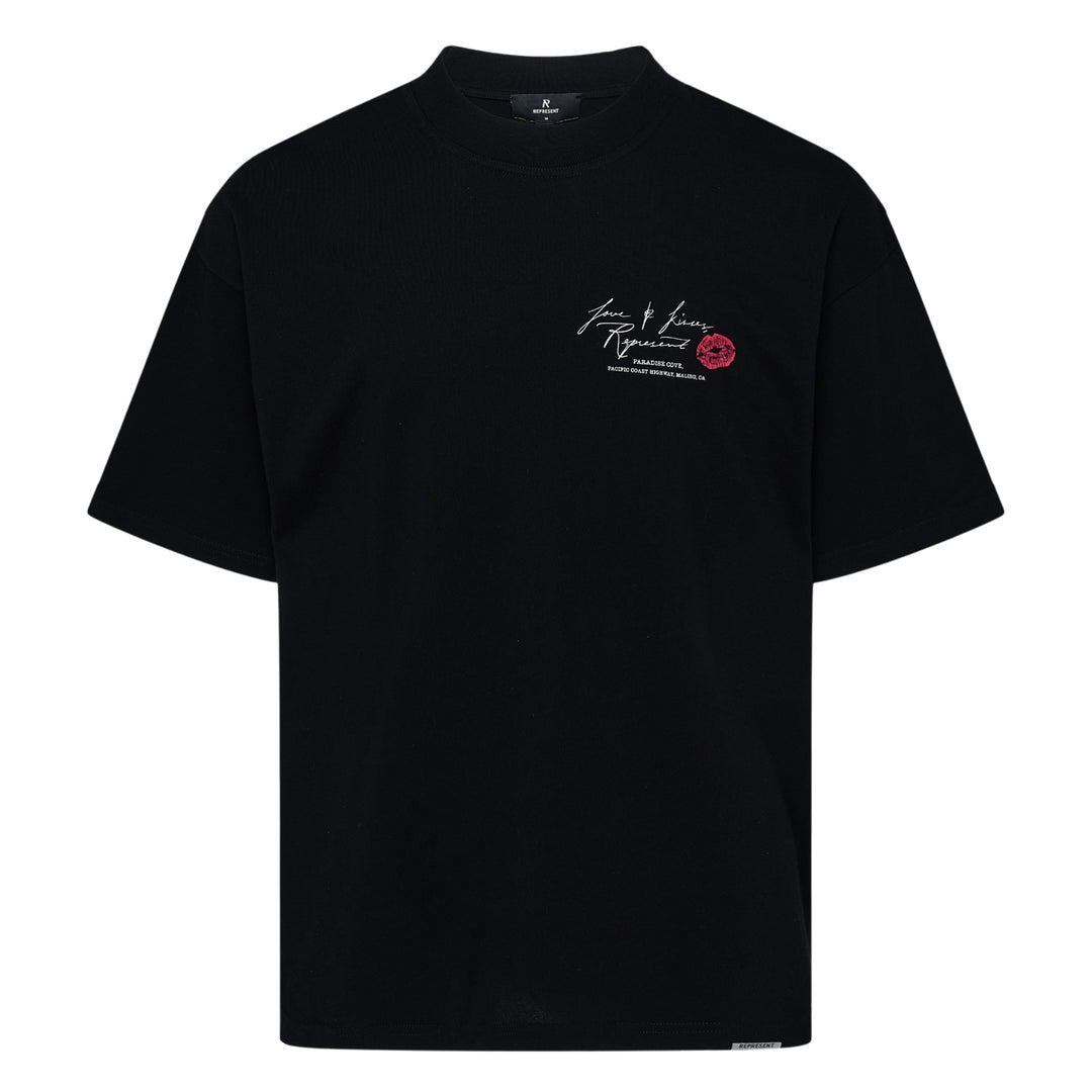 Back view of Represent Love & Kisses Tee in black, featuring a white cursive script graphic reading 'Love & Kisses, Represent' across the back