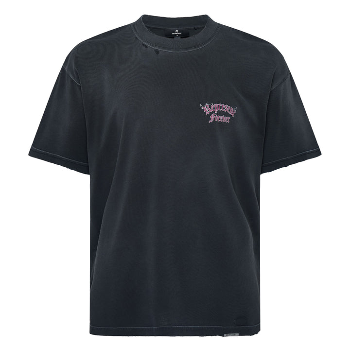 Back view of the Represent Duality Forever Graphic Tee in washed black, featuring gothic blackletter typography, winged lettering, and a mirrored skull heart graphic on a distressed oversized tee