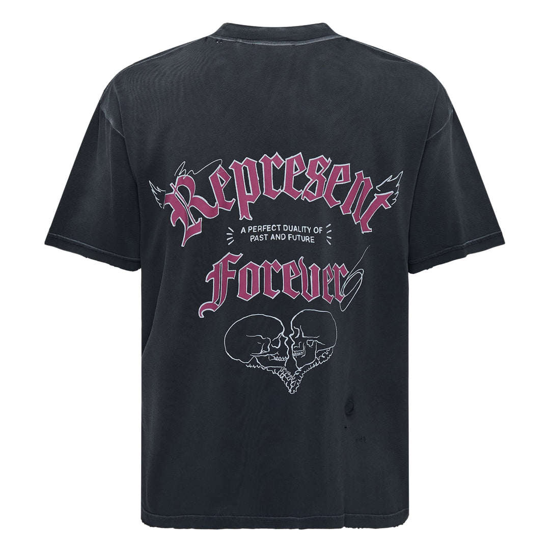 Back view of the Represent Duality Forever Graphic Tee in washed black, featuring gothic blackletter typography, winged lettering, and a mirrored skull heart graphic on a distressed oversized tee
