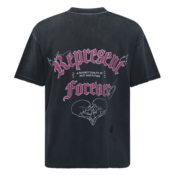 Back view of the Represent Duality Forever Graphic Tee in washed black, featuring gothic blackletter typography, winged lettering, and a mirrored skull heart graphic on a distressed oversized tee