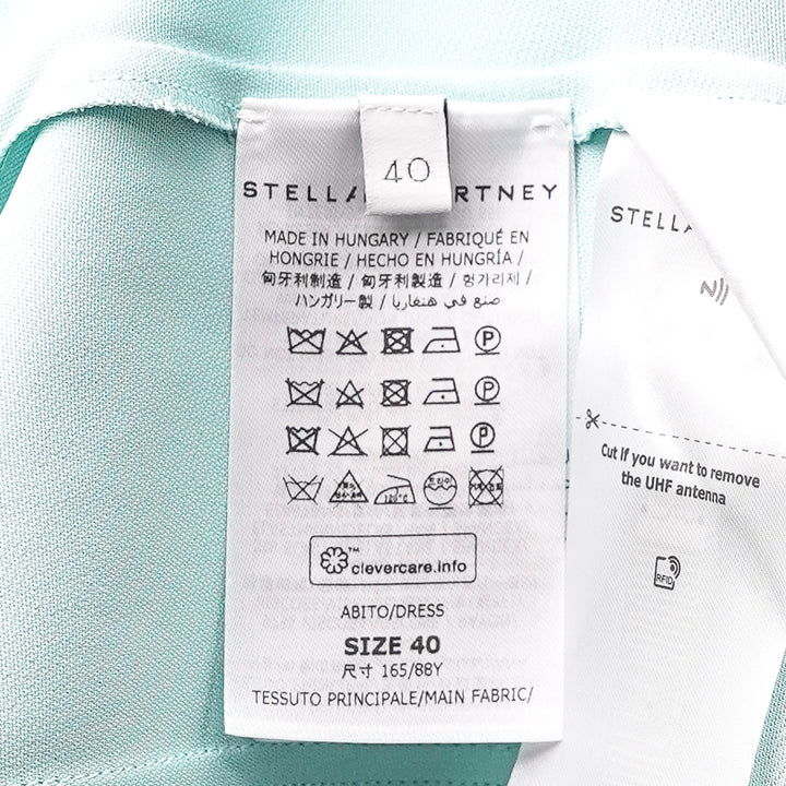Stella McCartney sleeveless aqua mint midi dress with asymmetric handkerchief hem and centre-front seam detailing on white background - view 3