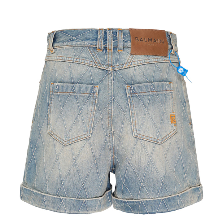 Balmain light blue acid-wash denim shorts with allover diamond quilted stitching, rolled cuffs, five-pocket design, and gold-tone logo button closure - view 2