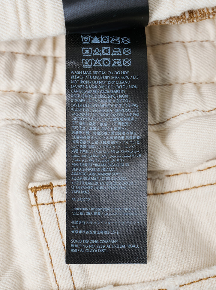 Amiri ecru drawstring denim shorts with contrast brown topstitching and embroidered logo at the hem - view 3