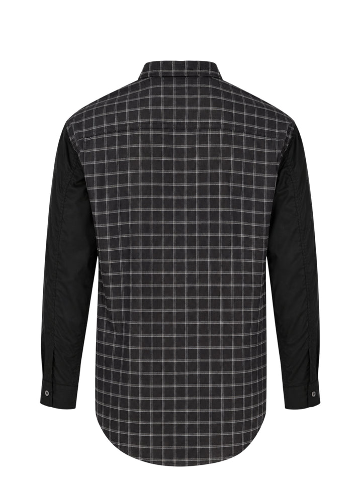 Comme des Garçons Homme long sleeve shirt with dark windowpane check cotton body and contrast solid black cotton broad cloth sleeves, shown flat on a white background - view 2