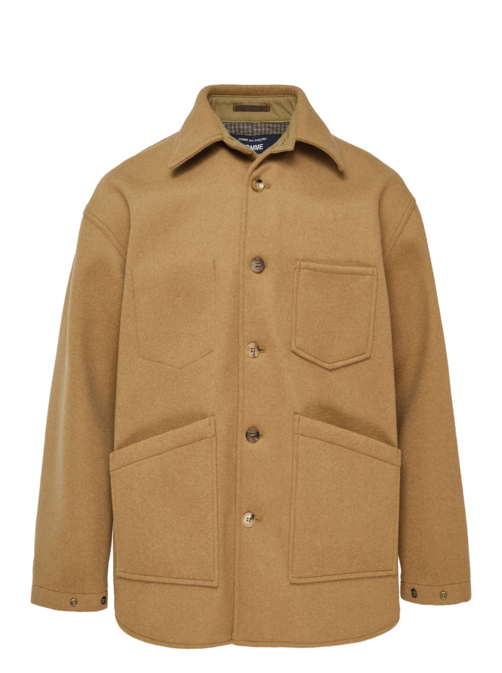 Comme des Garçons Homme wool beaver bonding jacket in camel, featuring a spread collar, five tortoiseshell-effect buttons, a chest patch pocket with angular seam detail, and two large lower patch pockets