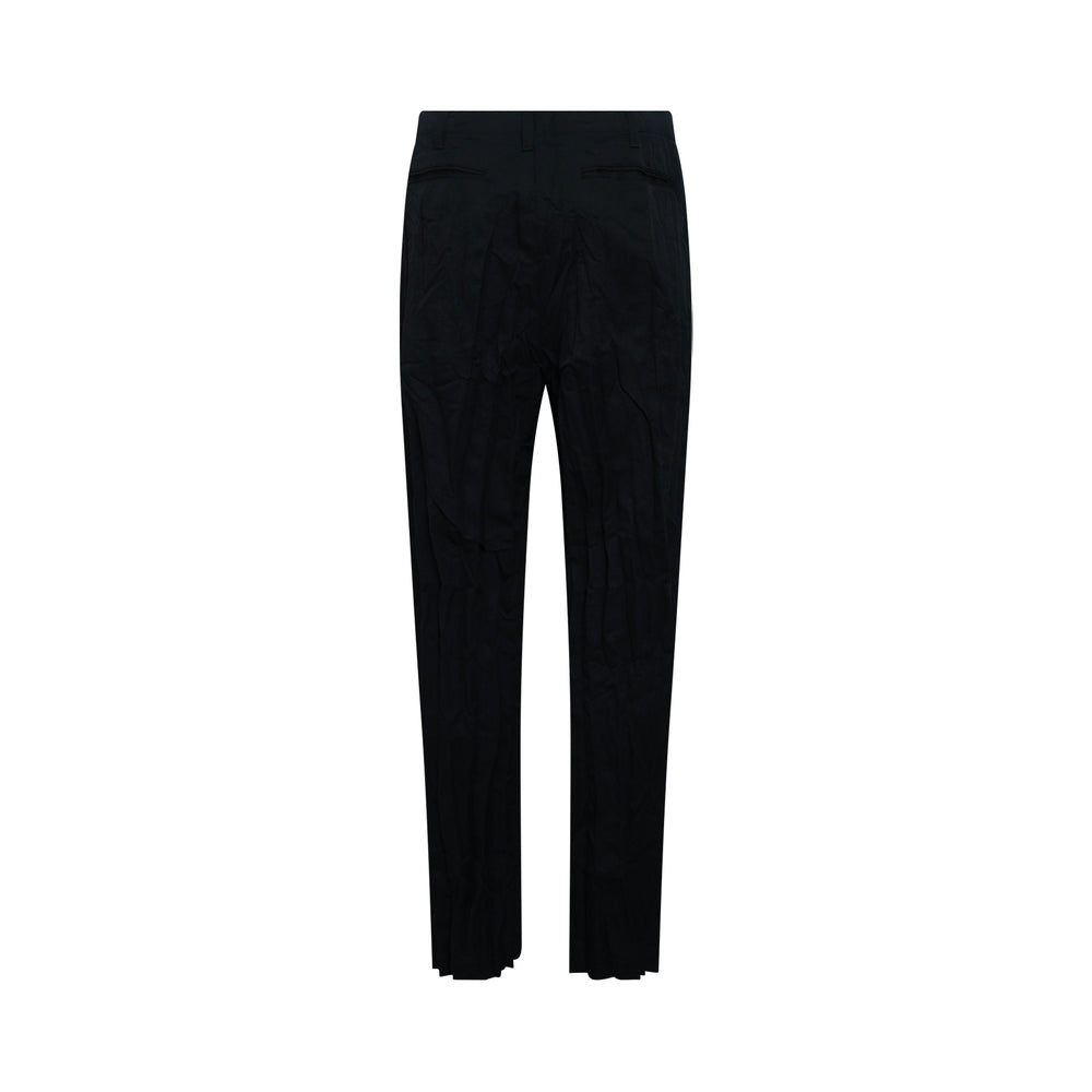 Comme des Garçons Homme black wool polyester twill tailored pants with pleated hem detail, front view on white background - view 2