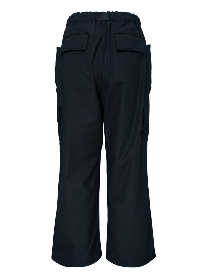 Black wide-leg cotton twill cargo pants with buckle webbing belt and flap utility pockets by Comme des Garçons Homme - view 2