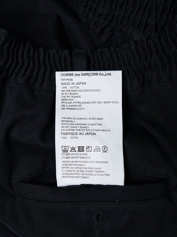 Comme des Garçons Homme black cotton twill pants with pleated front, elasticated waistband and wide cropped legs - view 4