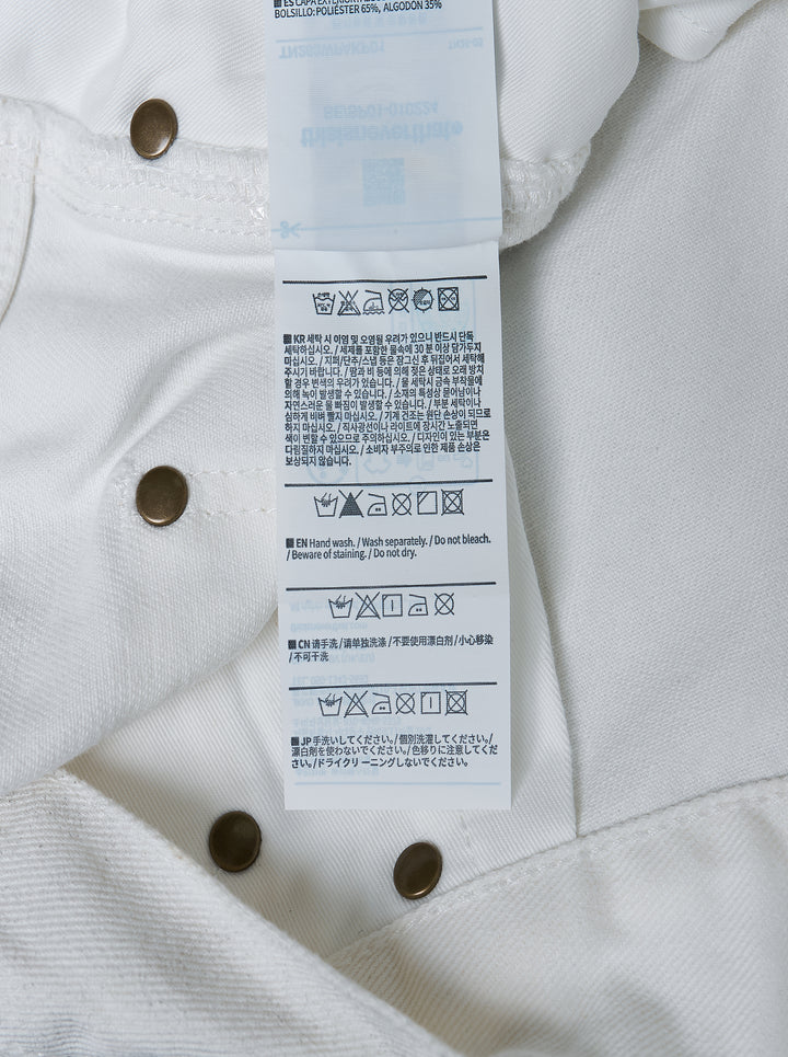 thisisneverthat Painter Pants in washed white with paint-worn finish, relaxed straight-leg silhouette, carpenter utility tab detail, and five-pocket construction — front view - view 4