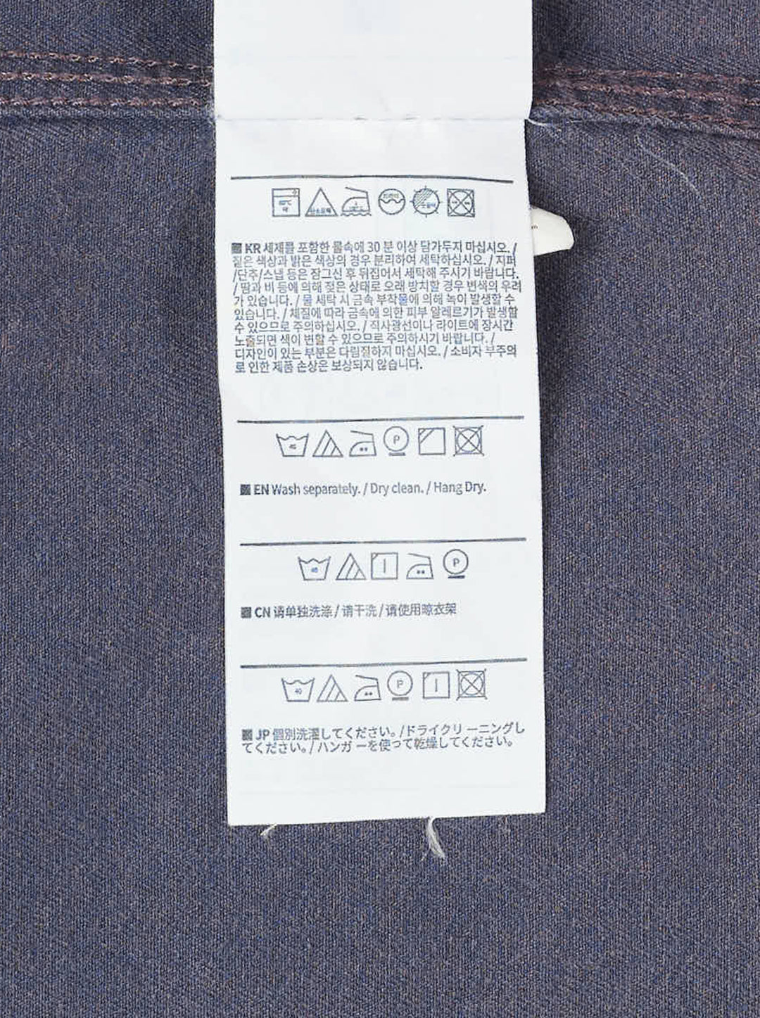 thisisneverthat Washed Twill Long Sleeve Shirt in faded charcoal, front view showing full button placket, chest patch pocket with embroidered script logo, and relaxed oversized silhouette - view 3