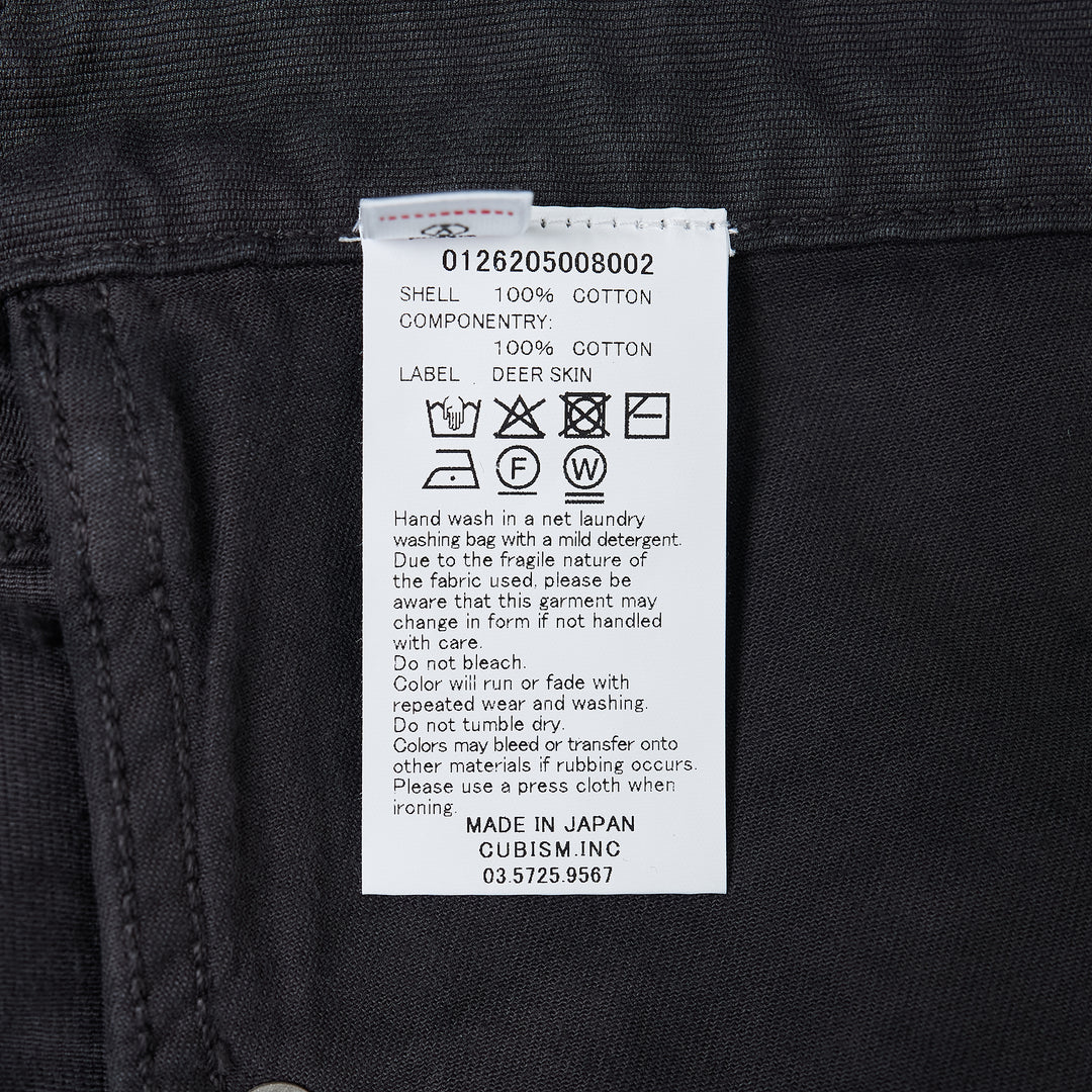 visvim Fluxus 03 Wide Corduroy Pants in washed black, featuring a high-rise waist, five-pocket construction, and a wide straight leg — front flat lay view - view 3