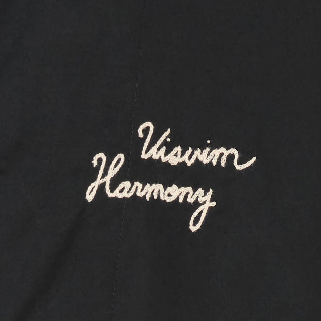 visvim Windfall Coach Jacket in black with embroidered Harmony script, snap-button front closure, and elasticated cuffs - view 3