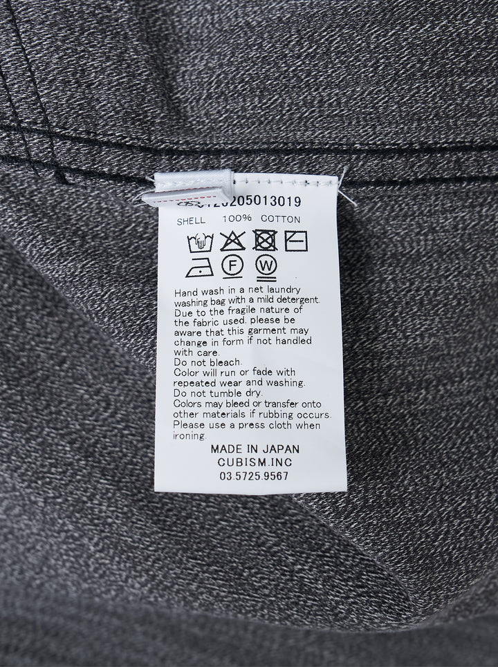 visvim Eclair Coverall Custom Long jacket in washed charcoal grey with paint splatter details, zip chest pocket and angled zip waist pockets - view 3