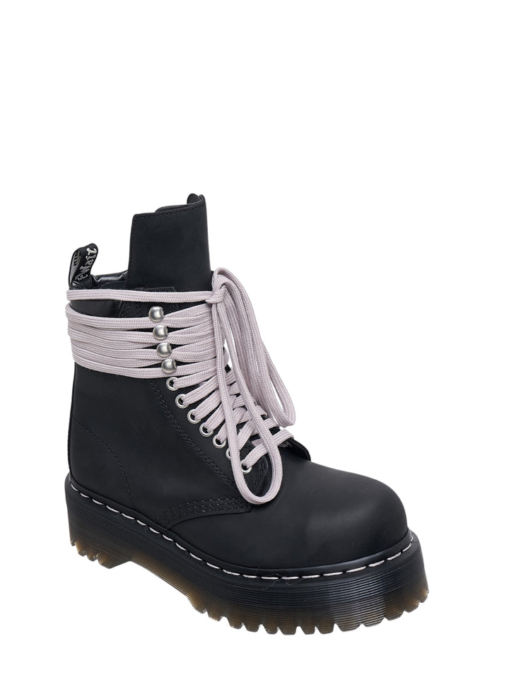 Rick Owens x Dr. Martens Quad Sole Platform Boot in black leather with lilac wrap laces and chunky ridged platform sole, side view - view 2