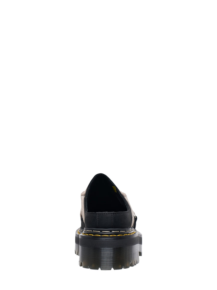 Rick Owens x Dr. Martens Quad Sole Megalace flatform mule in black with beige cord lacing, silver D-ring hardware, and chunky yellow-stitched cleated platform sole, side profile view - view 3