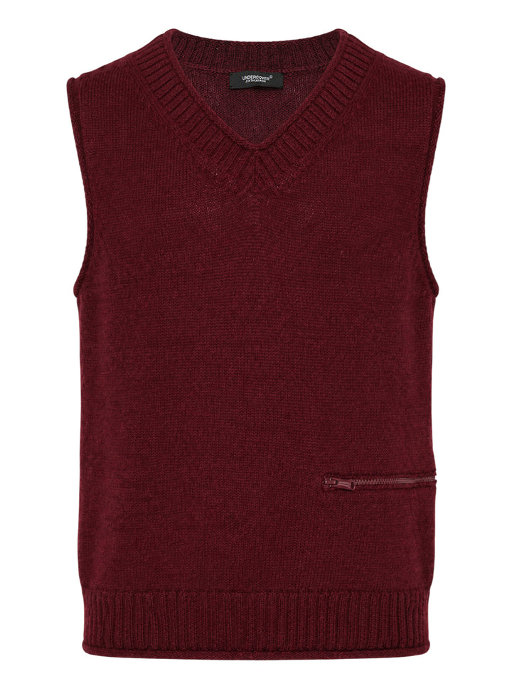 Undercover burgundy knit vest with ribbed V-neck and a horizontal zip pocket at the lower front