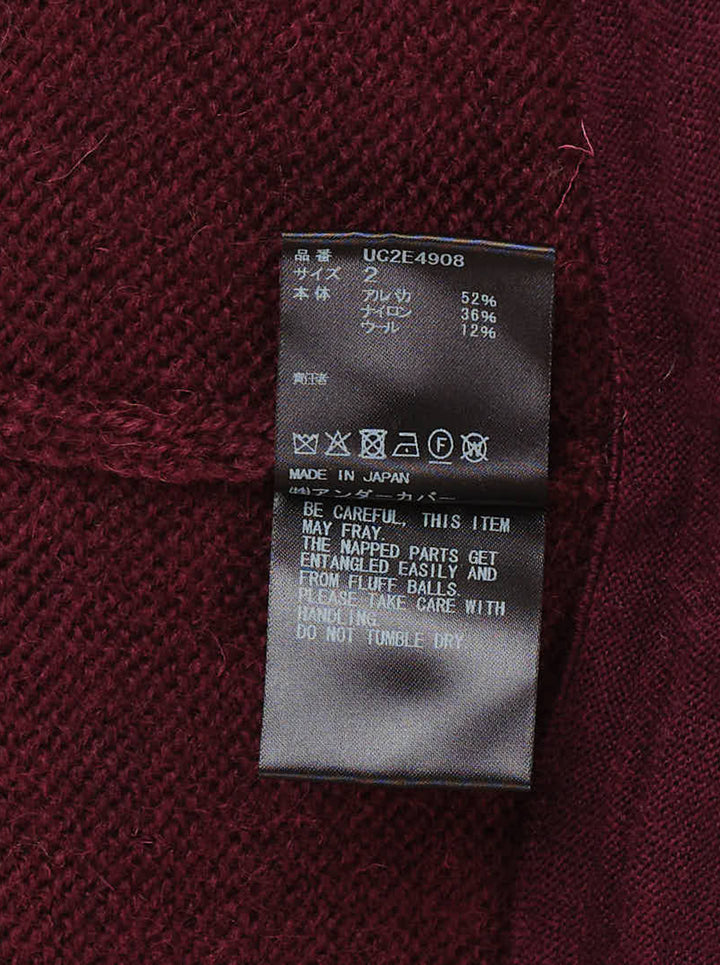 Undercover burgundy knit vest with ribbed V-neck and a horizontal zip pocket at the lower front - view 5