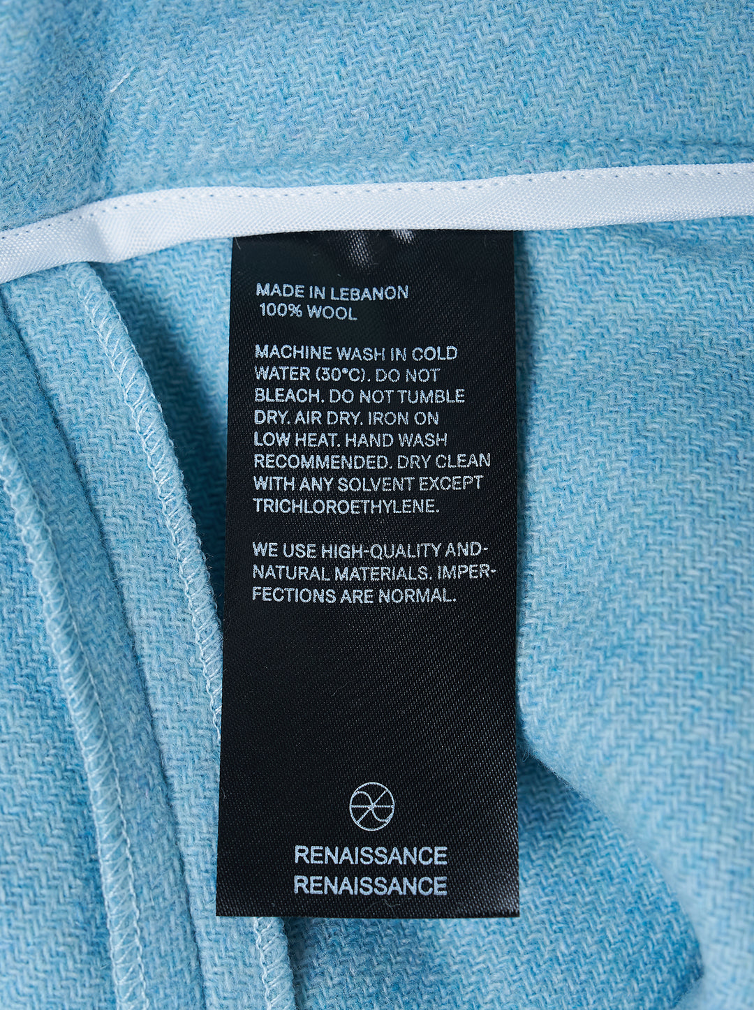 Sky blue asymmetric Claudia skort by Renaissance Renaissance with gathered fabric-covered button details and a cascading draped hem - view 3