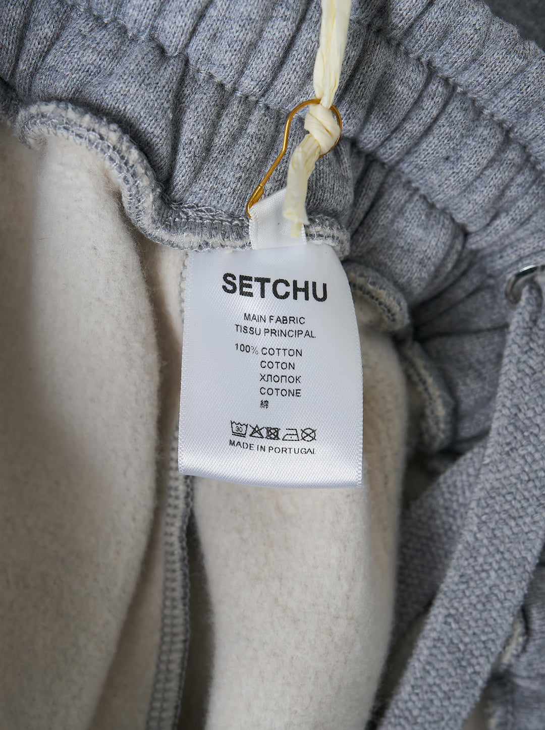 Setchu wide-leg sweatpants in heather grey with an elasticated waistband and small white logo print, shown from the front - view 3