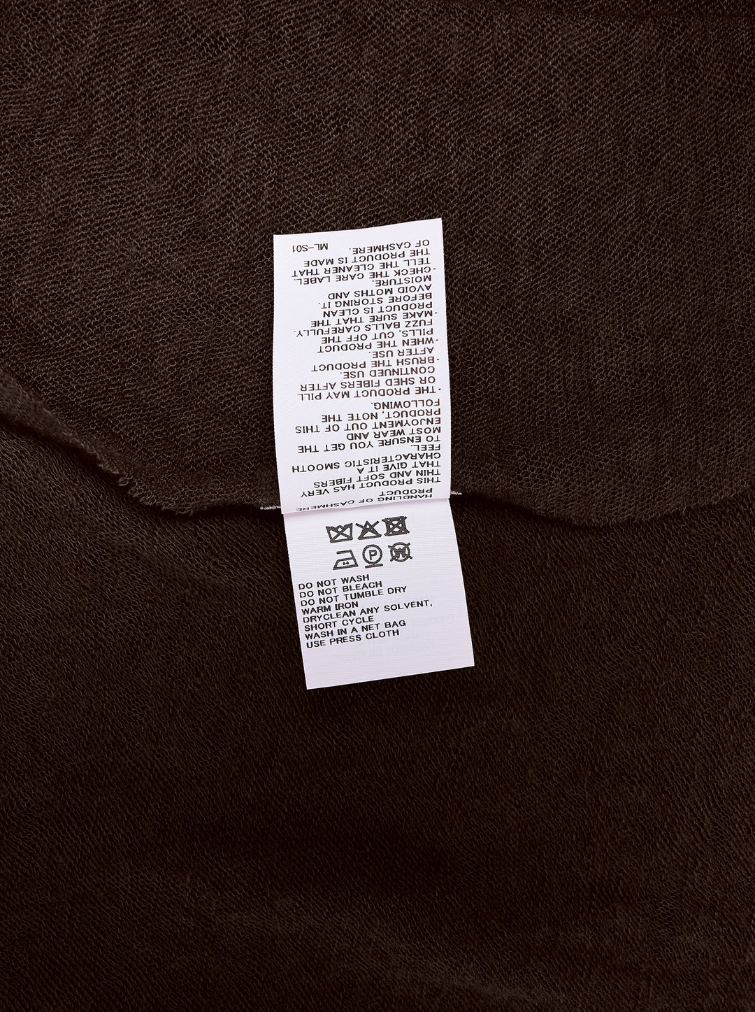 Issey Miyake dark brown cashmere knit stole with sheer lightweight texture and pointed angular ends, shown flat - view 3