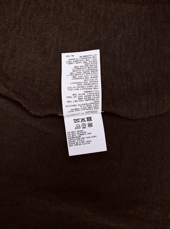 Issey Miyake dark brown cashmere knit stole with sheer lightweight texture and pointed angular ends, shown flat - view 3