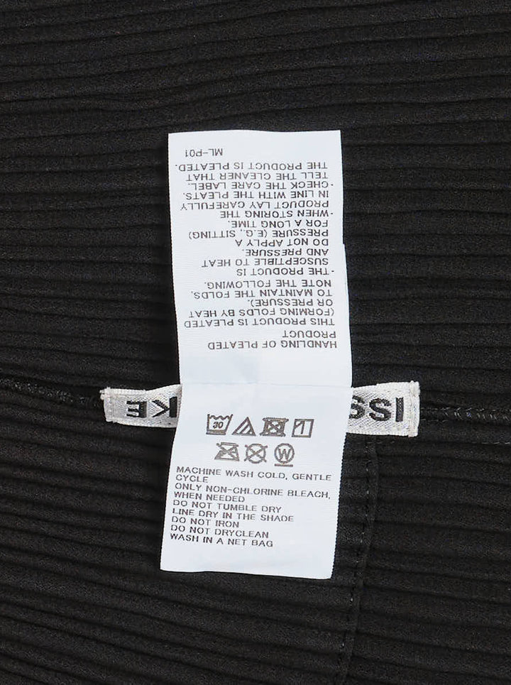 Issey Miyake Hatching Pleats long black pleated coat with notched lapel and two-button front - view 3