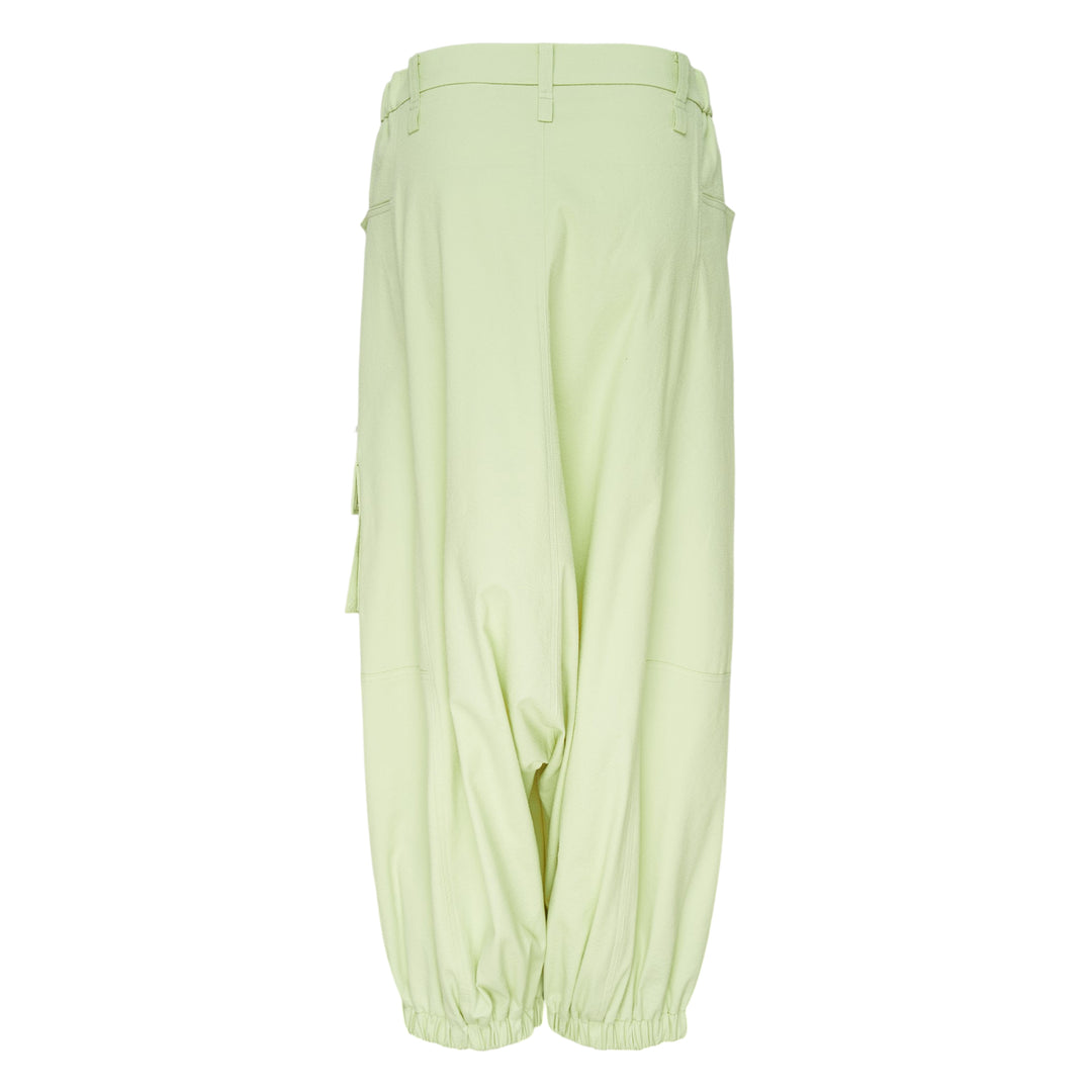 Issey Miyake Grainy Pants in black — wide-leg woven cargo trousers with zip thigh pockets, flap cargo pocket, and button-fastened ankle cuffs