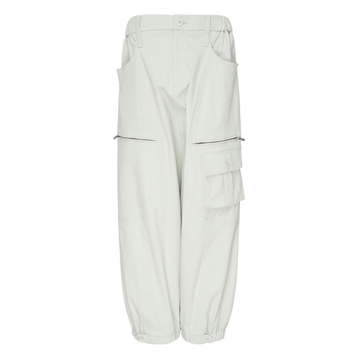 Issey Miyake Grainy Pants in black — wide-leg woven cargo trousers with zip thigh pockets, flap cargo pocket, and button-fastened ankle cuffs