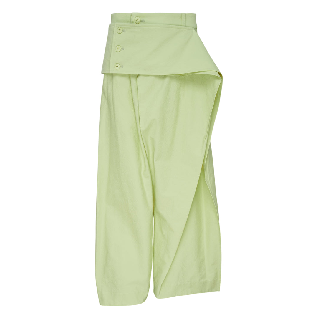Issey Miyake Grainy Pants in black — wide-leg woven trousers with a fold-over waistband, three-button detail, and asymmetric overlay panel