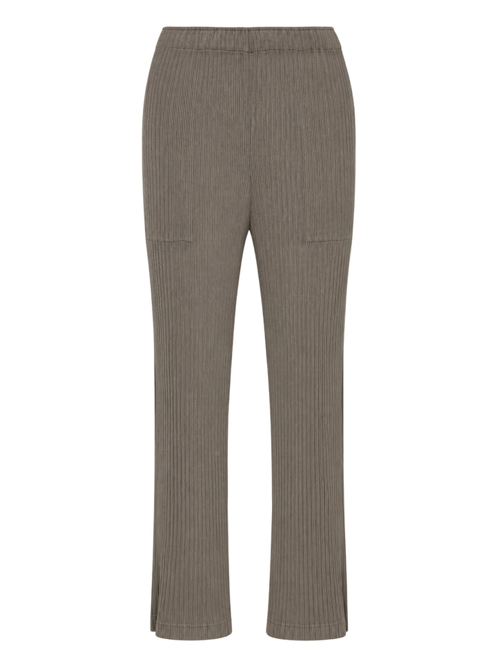 Issey Miyake Hatching Pleats pleated pants in muted taupe-grey with elasticated waist, patch pockets and straight leg, front view
