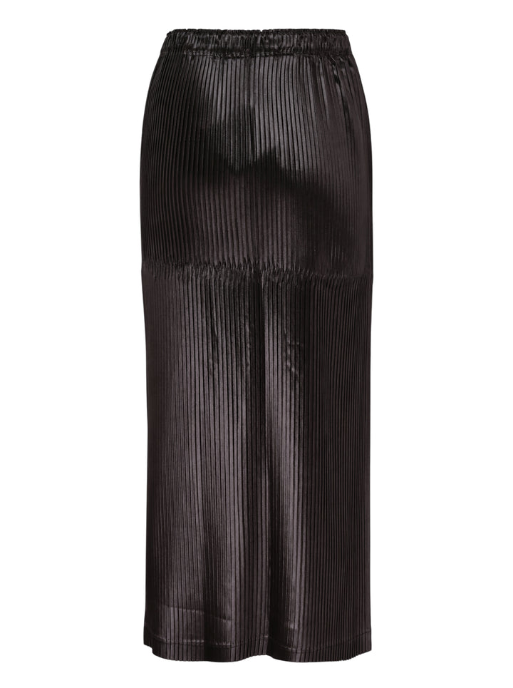 Issey Miyake Glossed Panels Pleated Skirt in black with fine vertical pleats, panelled seam detail and elasticated waistband - view 2