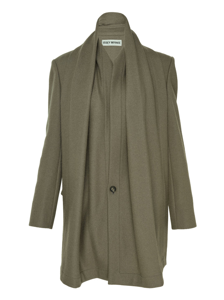 Issey Miyake Manner jacket in olive wool with integrated draped scarf collar and single button fastening