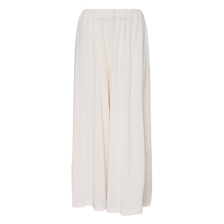Issey Miyake Drape Jersey Knit Pants in black, wide-leg silhouette with mixed-texture ribbed panel and elasticated waistband, flat lay on white background