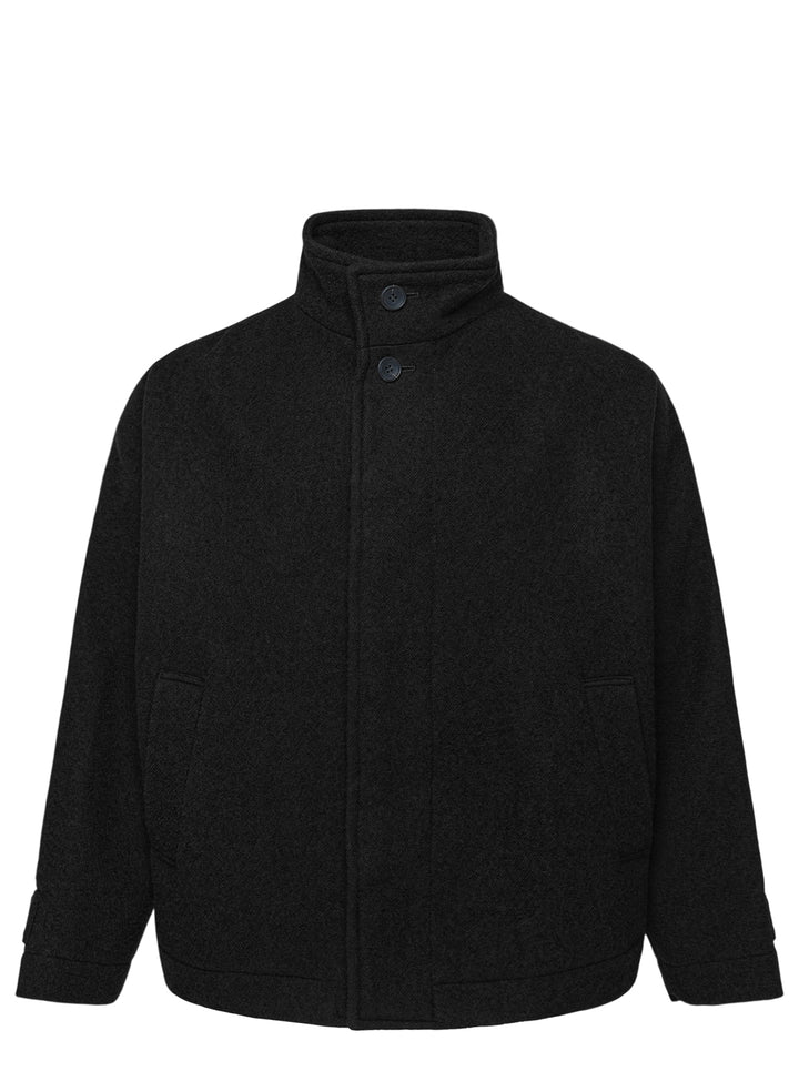 IM MEN Fuller Wool Blouson in black with stand collar, concealed button placket and slanted welt pockets, shown from the front