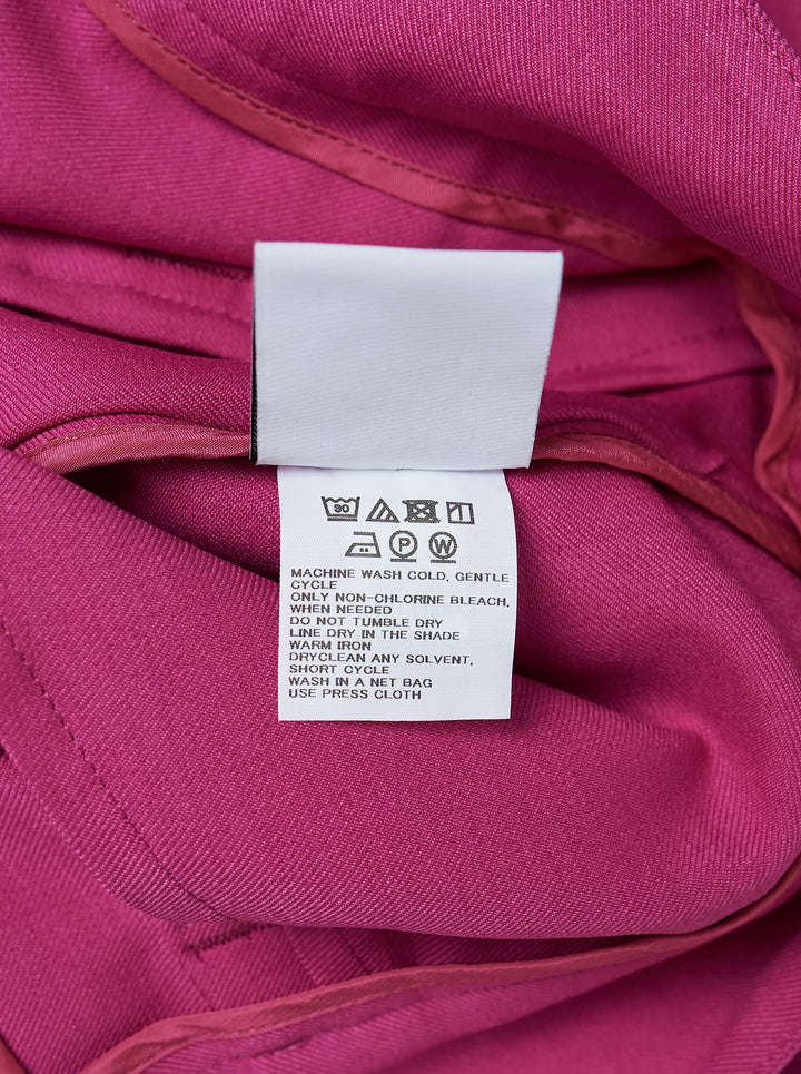 IM MEN Breeze Drape Woven Pants in fuchsia pink — high-waisted pleated wide-leg trousers with dramatic asymmetric draped fabric panels, shown flat on white background - view 3