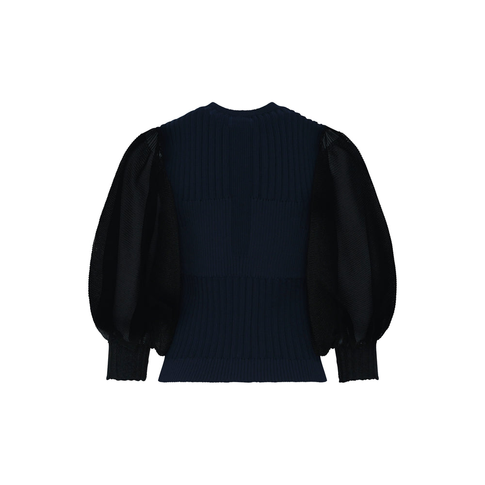 CFCL Fluted Lucent Puff Sleeve Cardigan in navy, featuring a ribbed knit body, sheer black voluminous puff sleeves, tonal button-front closure, and a patch pocket with frayed edge detail - view 2