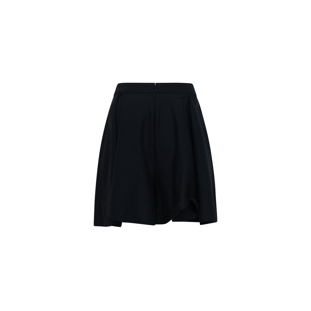 CFCL Soft Milan Tuck Wide Shorts in black, featuring a wide flared leg, tuck detailing at the waistband, and a fluid knit fabric, displayed flat on a white background. - view 2