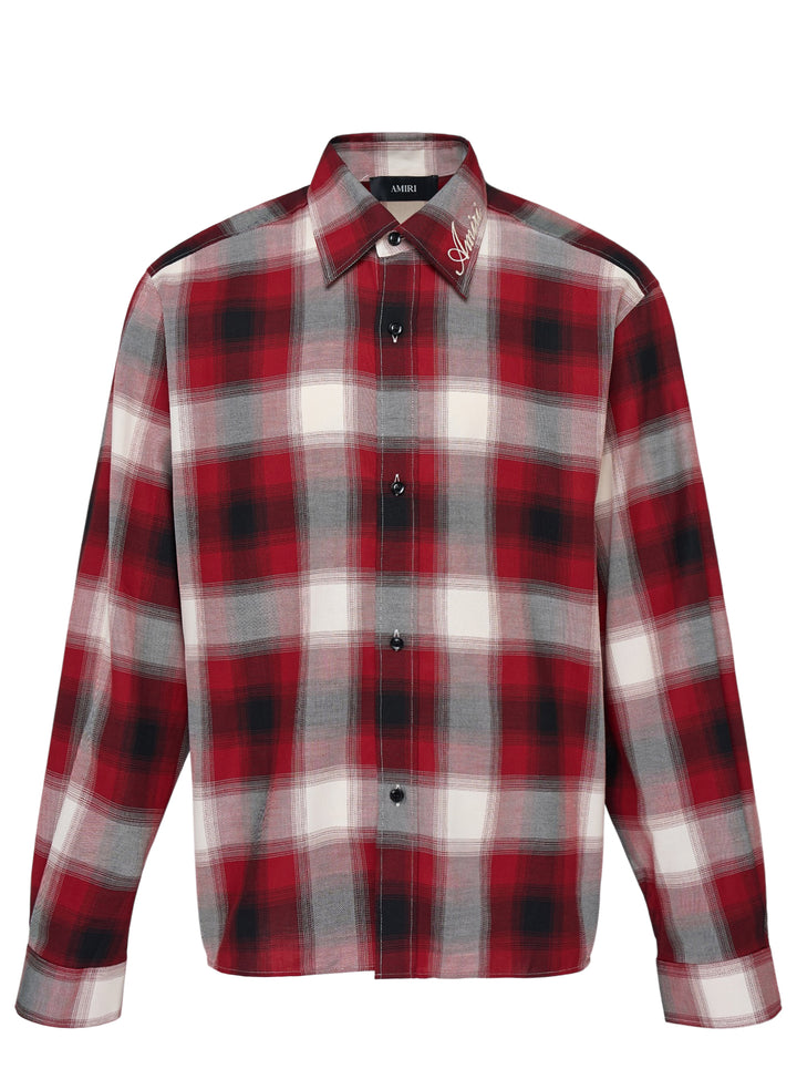 Amiri oversized flannel shirt in red, black and cream ombré plaid with embroidered script logo on the collar and black buttons