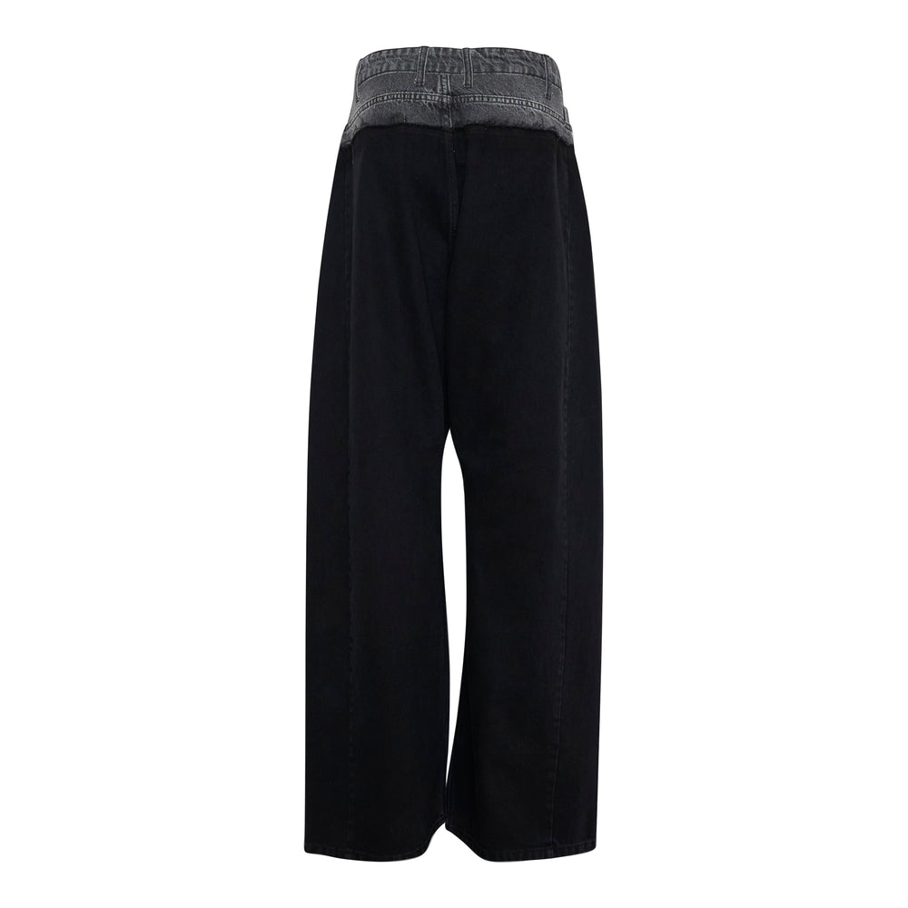 Litkovska wide-leg denim panel pants with contrast washed grey high-rise waistband and black wide-leg body, front view on white background