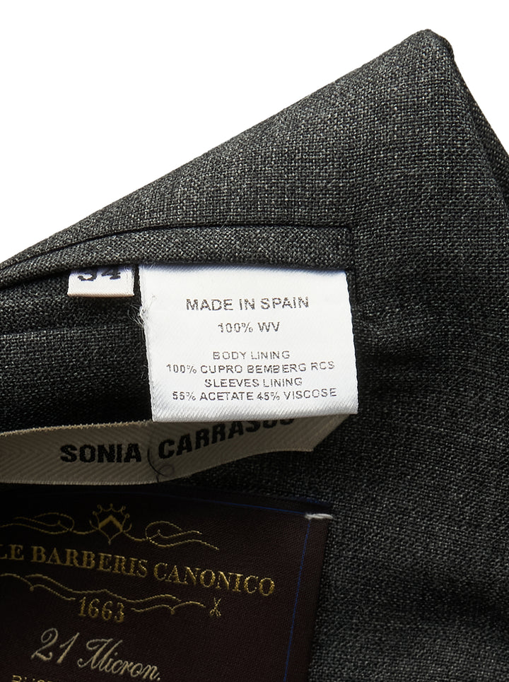 Sonia Carrasco Side Cut Blazer Vest in charcoal grey with open side panels revealing cream canvas interfacing and ribbon trim, notched lapel, and two-button front closure - view 3