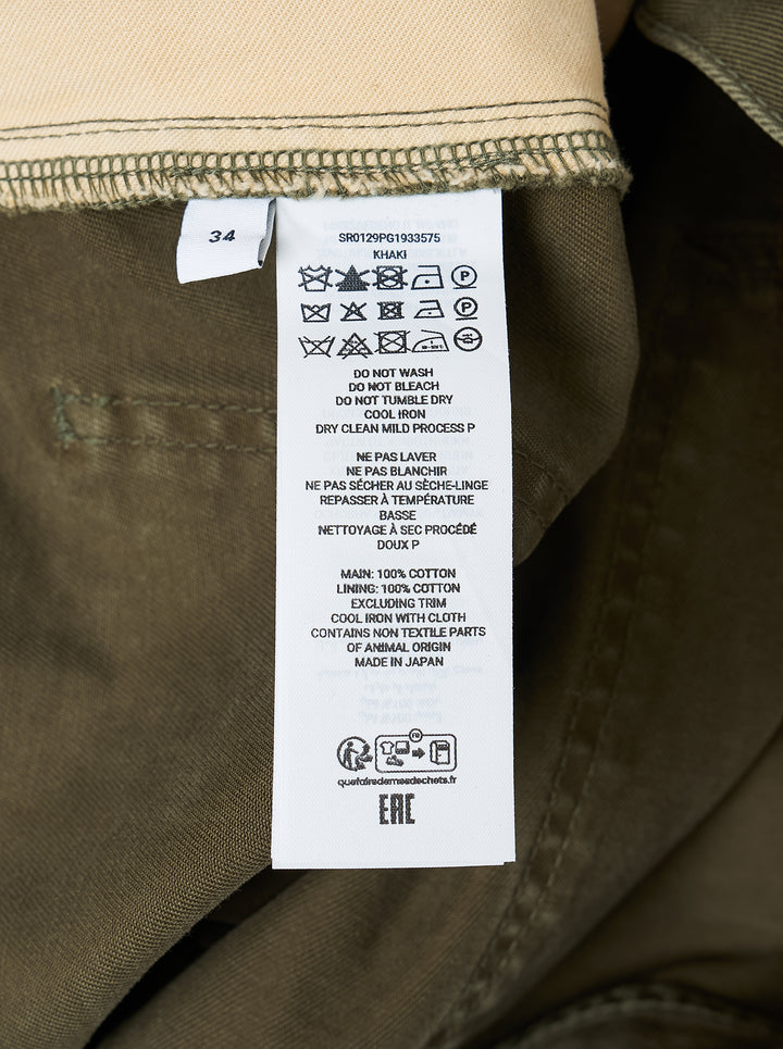JW Anderson twisted patch pocket shorts in olive green with asymmetric fly, curved seams and flap cargo pockets - view 4