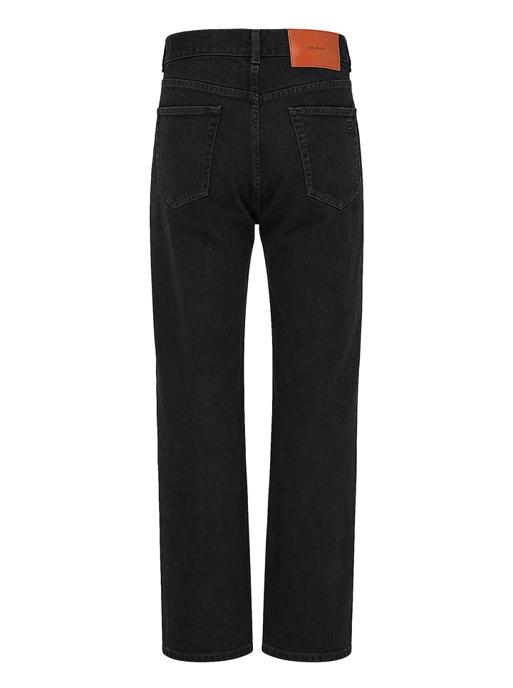 Balmain straight fit black denim jeans shown from the front with five-pocket styling, button closure and copper-tone rivets - view 2