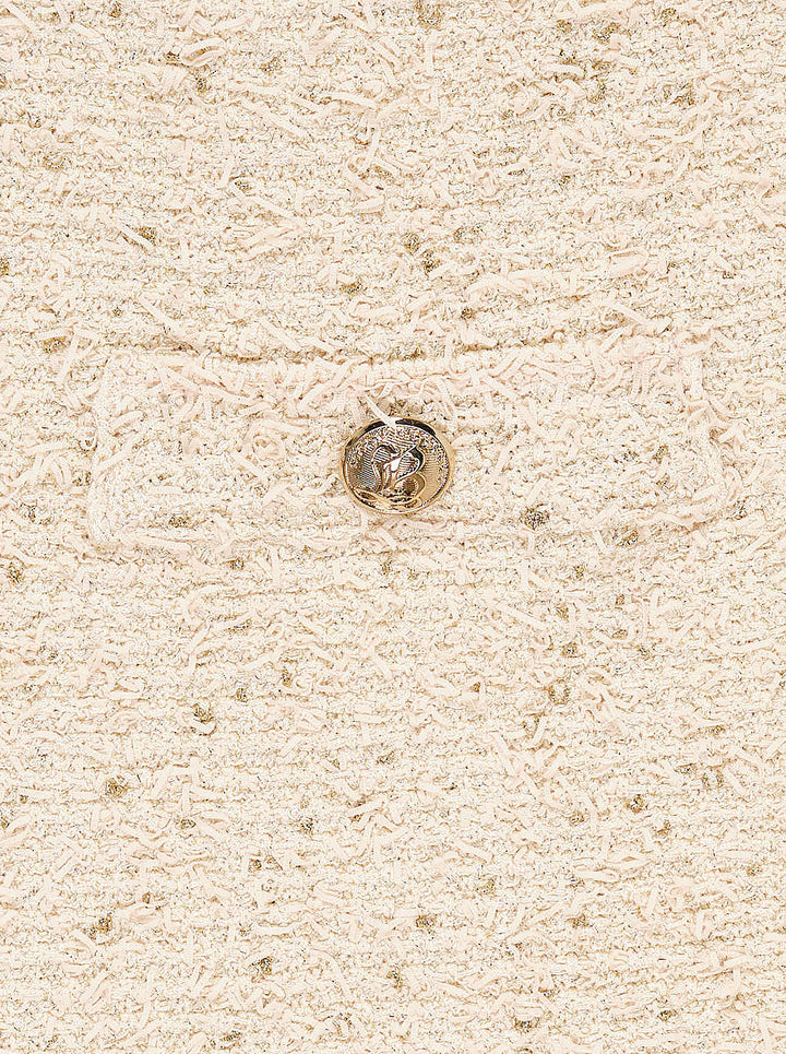 Balmain cream tweed knit mini skirt with gold metallic flecks and two flap pockets with embossed gold-tone buttons - view 3