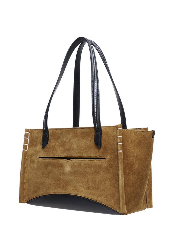 JW Anderson Elongated Loafer Cabas tote bag in tan suede with black leather shoulder handles, curved leather base, and whipstitch gusset detailing - view 2
