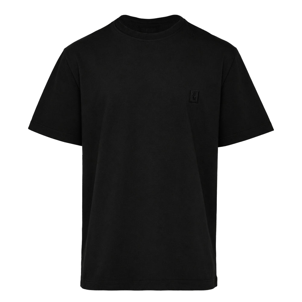 Wooyoungmi Back Logo Tee in black with a tonal embroidered monogram patch on the chest, featuring a relaxed oversized fit and crew neckline