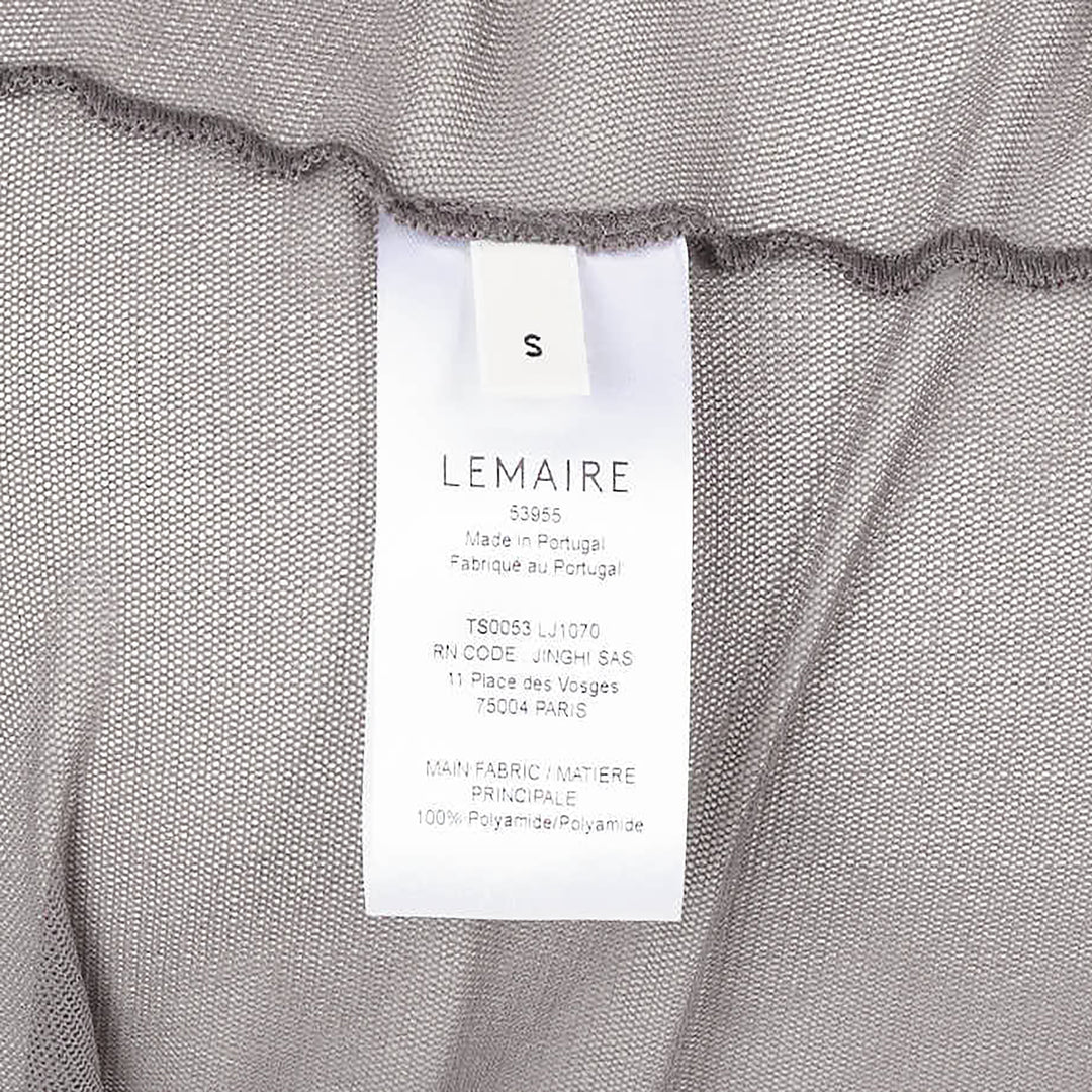 Lemaire Ballerina Foulard Mesh Top in grey — sheer fine-knit turtleneck with long sleeves, integrated bandeau inner layer, and cropped gathered hem, photographed flat on a white background