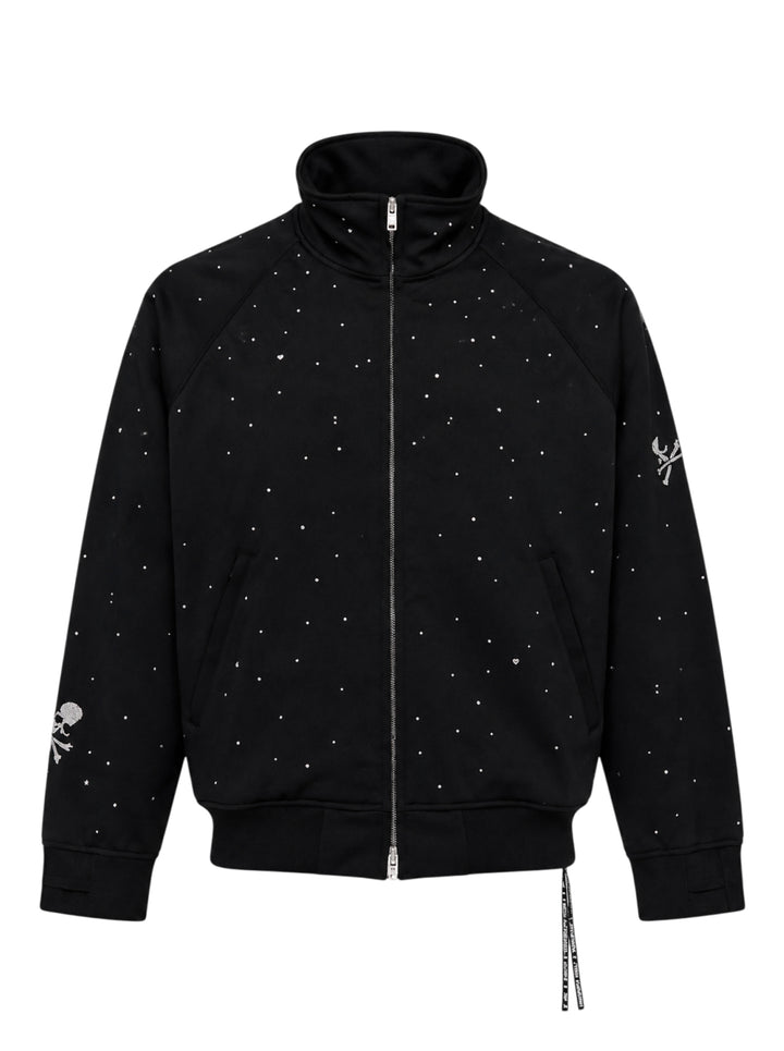 Mastermind black jersey track jacket embellished with scattered Swarovski crystals and crystal skull-and-crossbones motifs on the sleeves