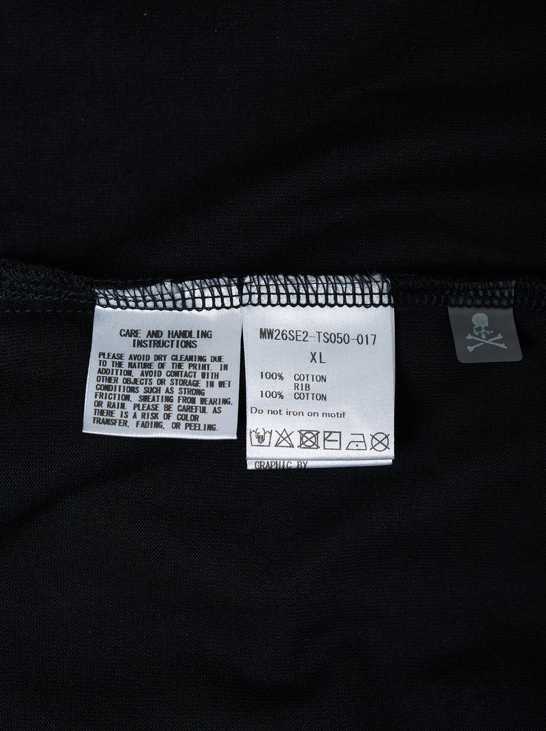 Mastermind black short sleeve tee with a white spray-paint stencil logo graphic on the chest and a logo drawcord at the hem - view 3