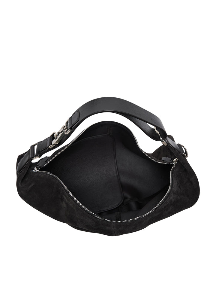 Lemaire Quiver Clip Bag in black suede leather with crescent silhouette, adjustable strap, gunmetal hardware, and exterior zip pocket - view 4