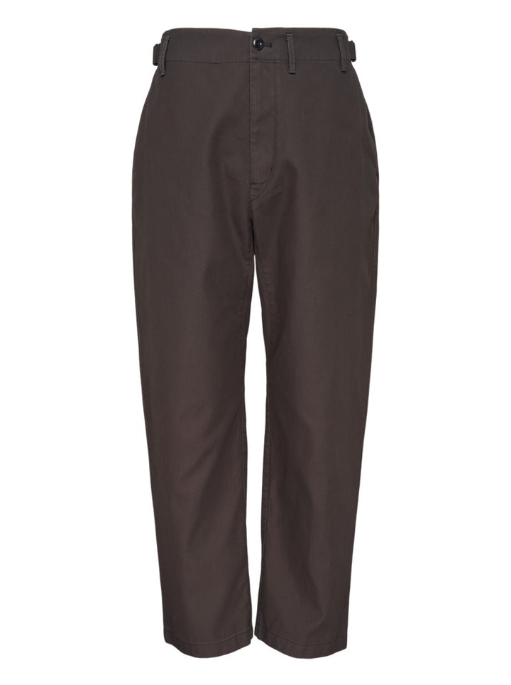 Lemaire tapered pants in heavy cotton with adjustable side waist tabs and button fly, shown from the front